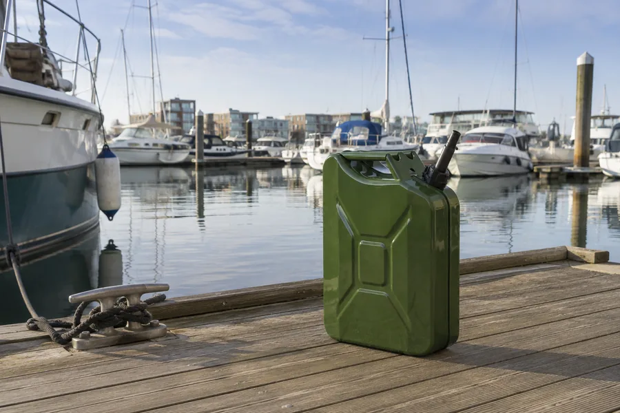 20L Steel Fuel Tank with Spout in use: Marina & dockside